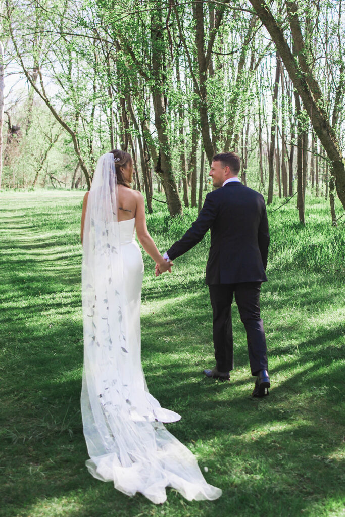 wedding, wedding design, virginia wedding, tented wedding, outdoor wedding, green and white wedding, wedding design, bride and groom, bridal corset dress, colorful bridal veil, floral wedding veil