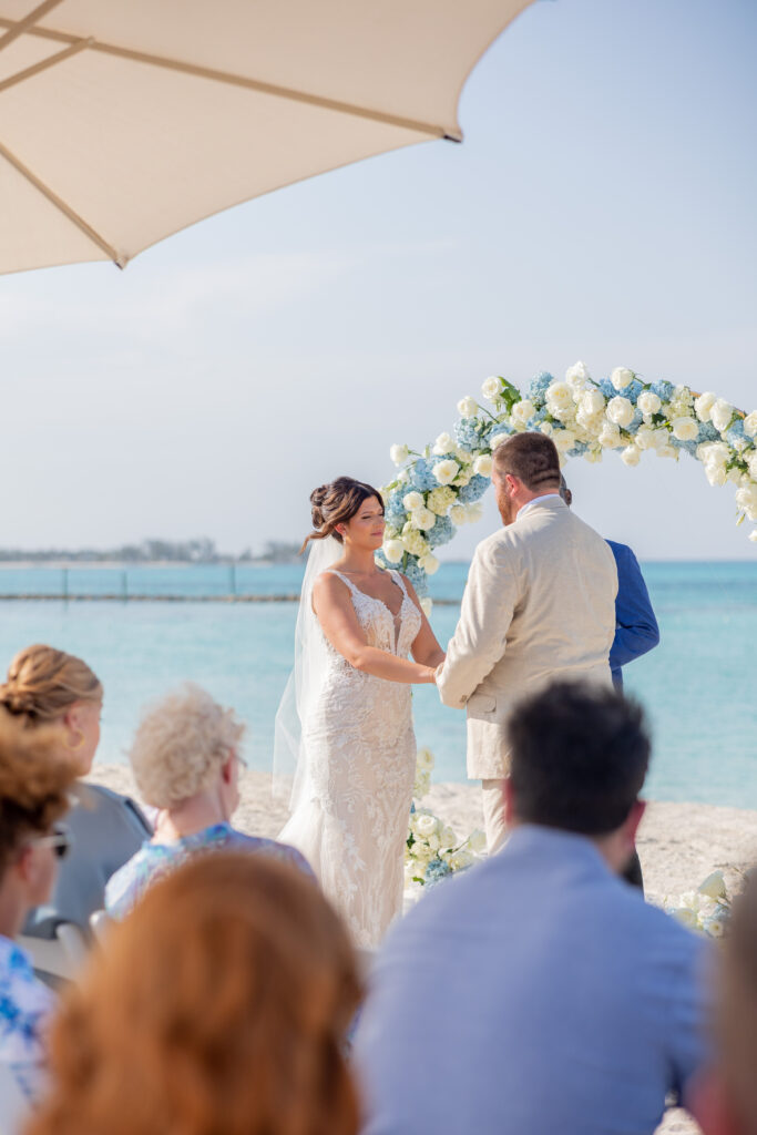 bahamas wedding, destination planner, wedding ceremony, white and blue wedding ceremony, beach ceremony, destination wedding, bride and groom