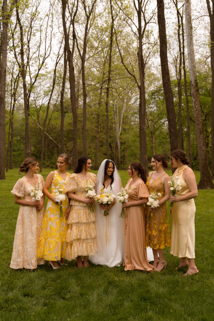 Black Iris Estate, Carmel indiana wedding venue, bride with bridesmaids, yellow bridesmaid dresses, outdoor wedding, outdoor wedding, bridesmaids bouquets