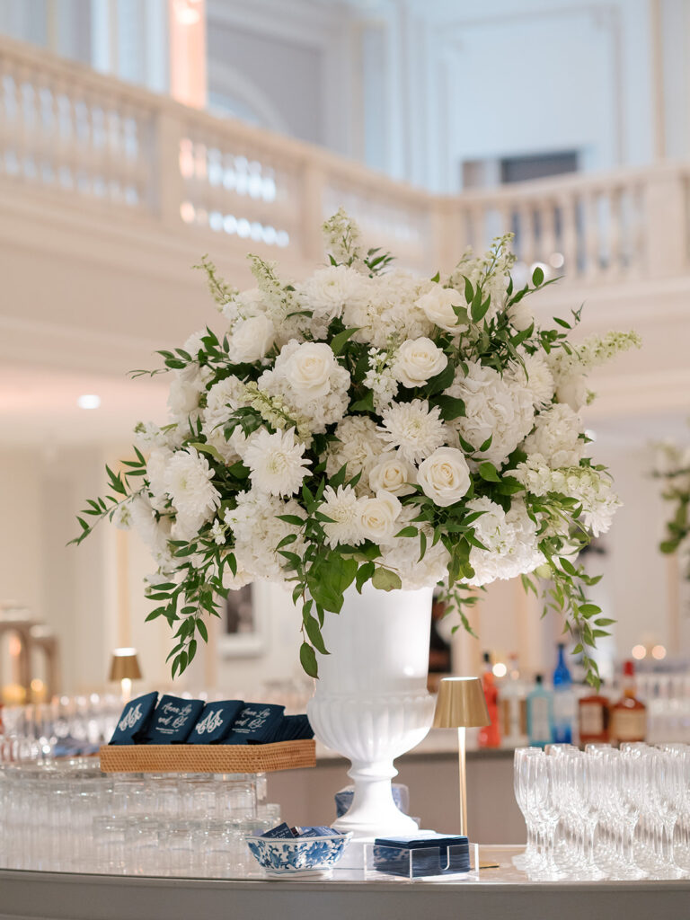 National Museum of Women in the Arts wedding, white wedding florals, wedding centerpiece, wedding koozies