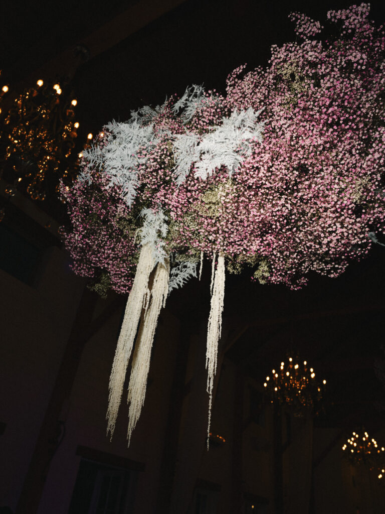 the seclusion wedding, wedding reception, reception white pink flowers, summer wedding, luxury wedding planner, floral ceiling installation, purple wedding flowers