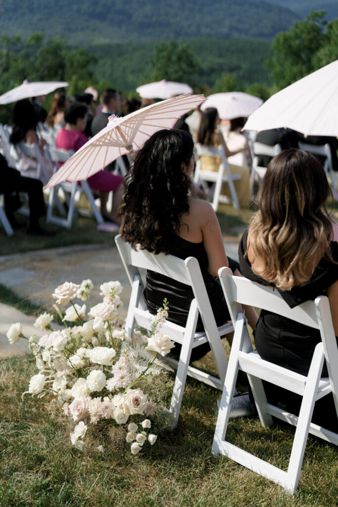 the seclusion wedding, wedding ceremony, ceremony white florals, outdoor wedding, summer wedding, luxury wedding planner