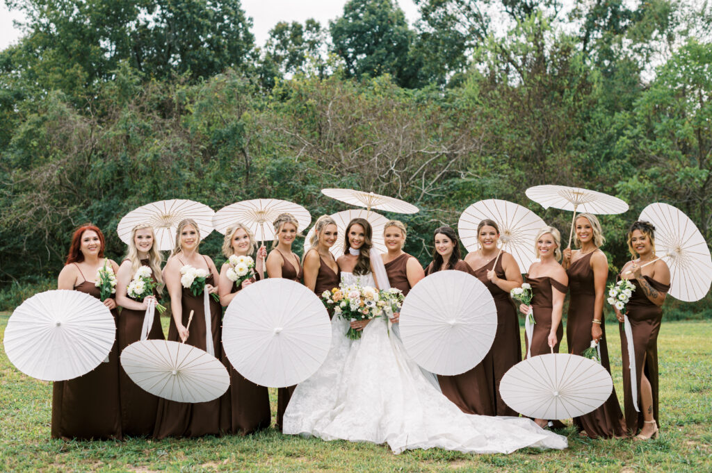 private estate wedding, wedding flowers, bride and bridesmaids, wedding, luxury wedding planner, luxury wedding, wedding design and planning, wedding planner, wedding ceremony, bridal bouquet, bridesmaids dress, brown bridesmaids dress, wedding parasols