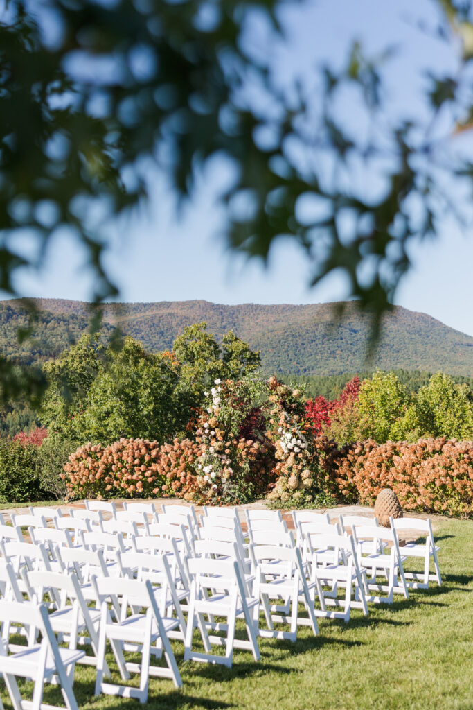 the seclusion wedding, fall wedding, ceremony, ceremony flower arch, fall wedding flowers