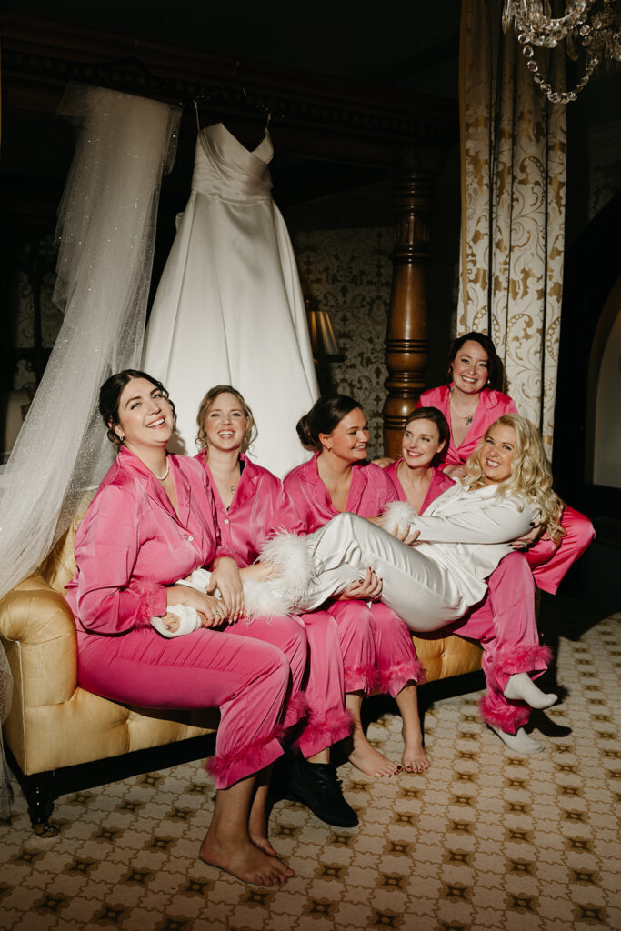 dover hall wedding, winter wedding, bride and bridesmaids pijamas, pink bridesmaids pijamas