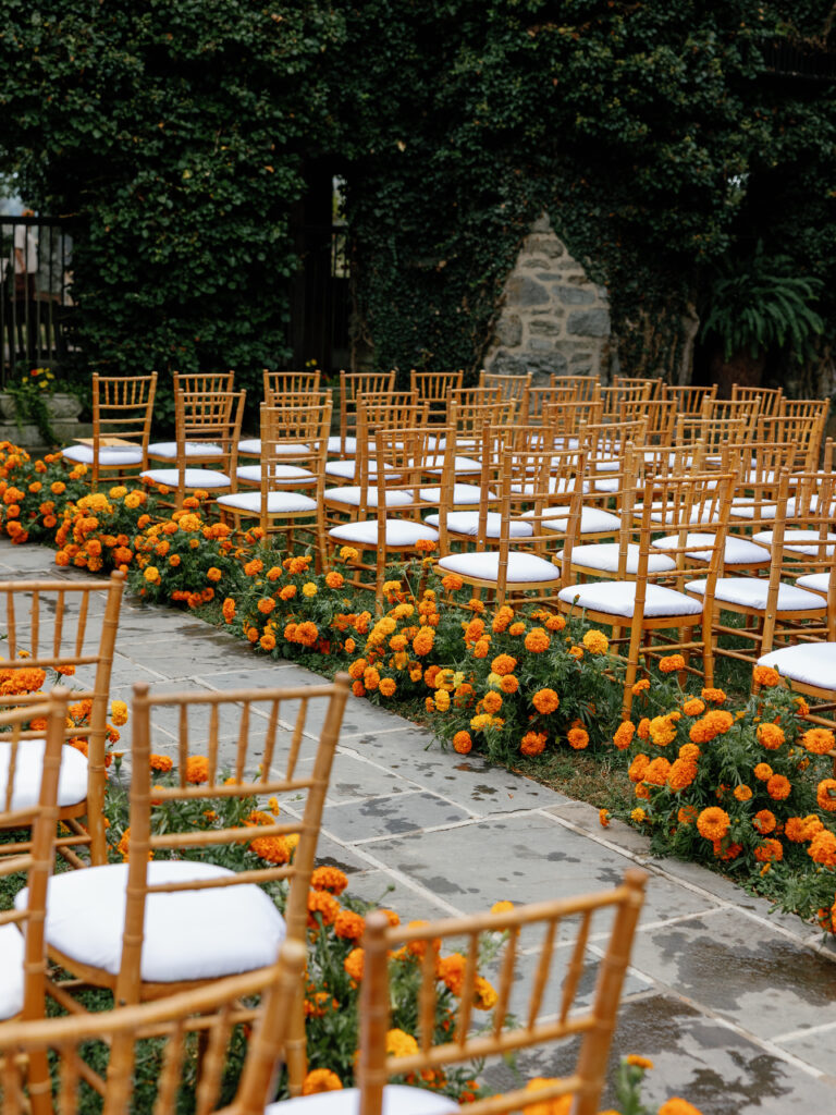 goodstone inn wedding, tented wedding, virginia wedding, luxury wedding, luxury wedding planner, orange wedding, outdoor wedding, ceremony, ceremony florals, orange wedding florals, orange carnations