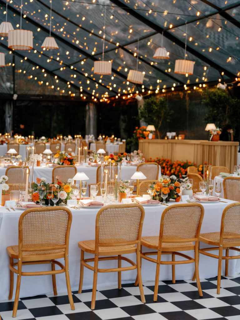 goodstone inn wedding, tented wedding, virginia wedding, luxury wedding, luxury wedding planner, orange wedding, outdoor wedding, reception, tented reception, black navitrac tent, wedding reception, orange wedding florals, reception tables, wedding tablescape