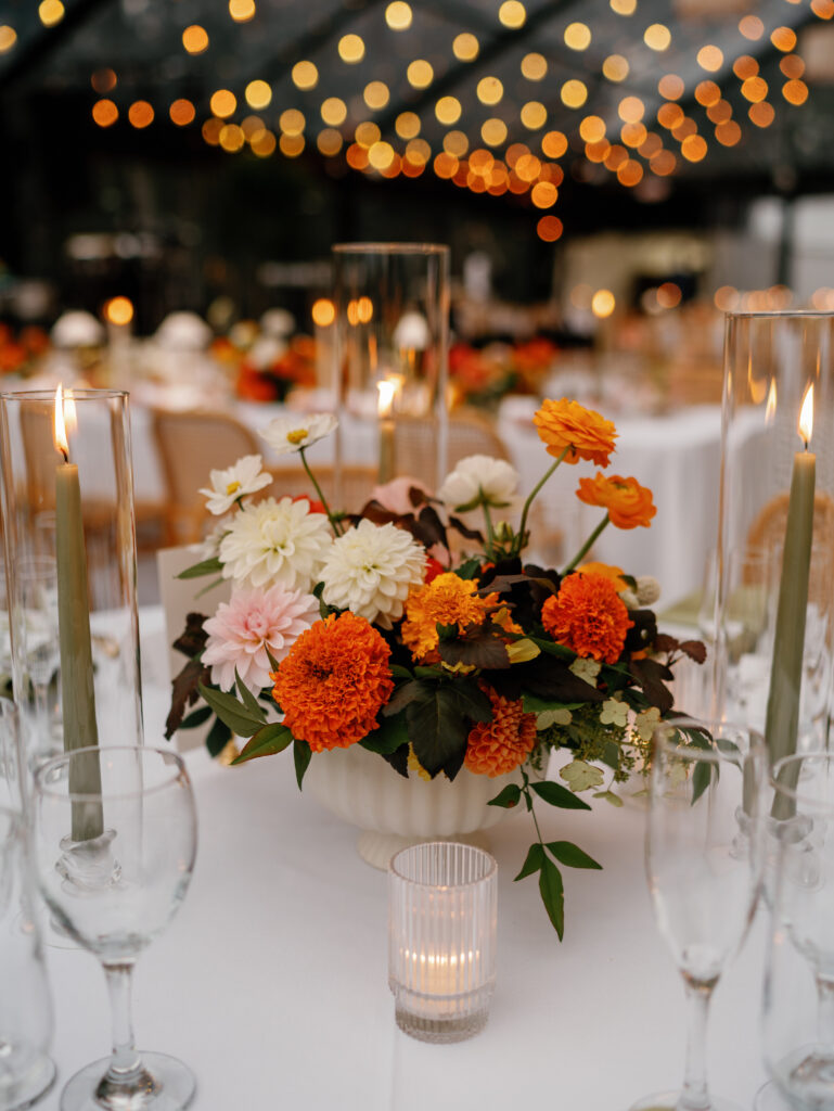 goodstone inn wedding, tented wedding, virginia wedding, luxury wedding, luxury wedding planner, orange wedding, outdoor wedding, reception, tented reception, black navitrac tent, wedding reception, orange wedding florals, reception tables, wedding tablescape