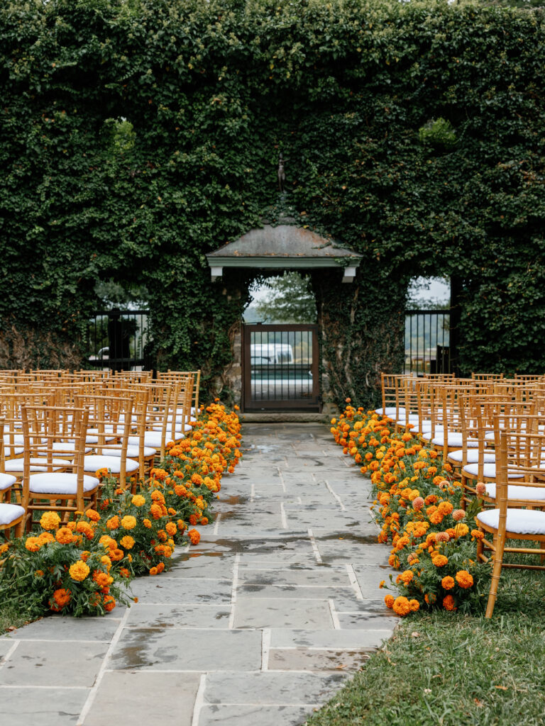 goodstone inn wedding, tented wedding, virginia wedding, luxury wedding, luxury wedding planner, orange wedding, outdoor wedding, ceremony, ceremony florals, orange wedding florals, orange carnations
