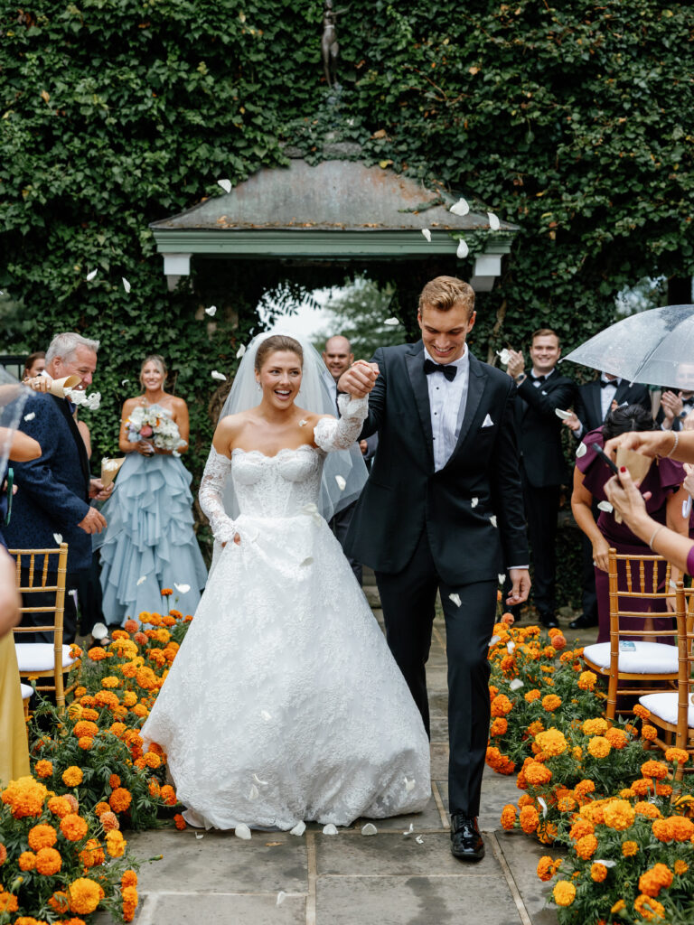 goodstone inn wedding, tented wedding, virginia wedding, luxury wedding, luxury wedding planner, orange wedding, outdoor wedding, ceremony, ceremony florals, orange wedding florals, orange carnations, bride and groom