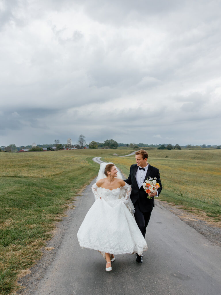goodstone inn wedding, tented wedding, virginia wedding, luxury wedding, luxury wedding planner, orange wedding, outdoor wedding, reception, tented reception, black navitrac tent, wedding reception, bride and groom, bridal bouquet