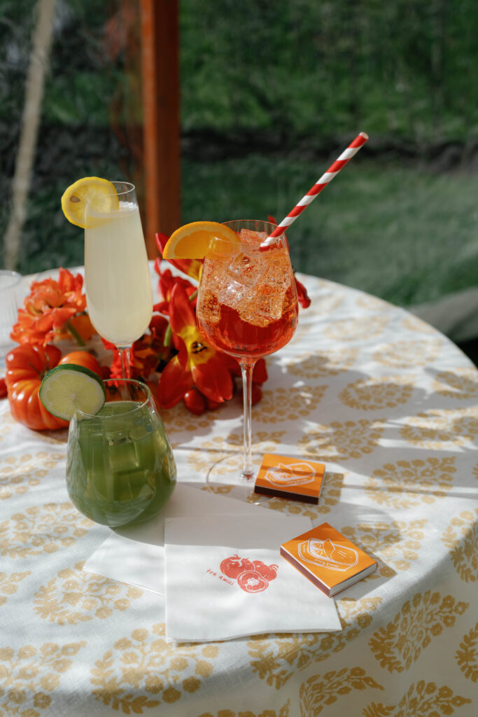 italy inspired wedding, yellow florals, wedding industry event, cocktail menu, matcha margarita, aperol spritz, wedding cocktail, custom matchbox